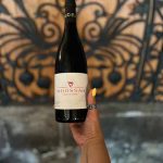 Moossah Red and a century-old work of art made from wood and metal.